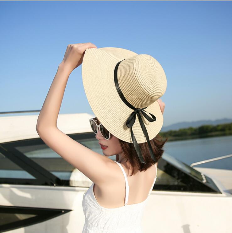 Women'S Folding Wide Brim Straw Hat With Bow
